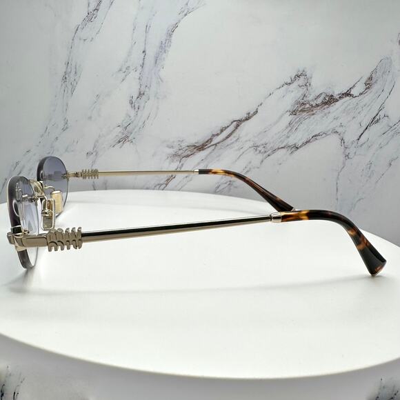 New MIU MIU Sunglasses Oval MU A54S Pale Gold Rimless Gradient Metal ZVN80O main image 11